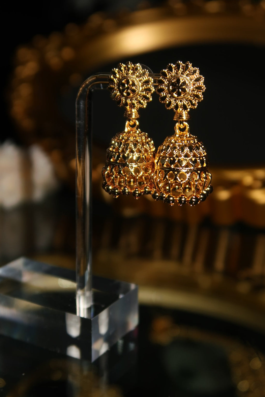 Gold plated Sabia jhumka earrings with floral stud top