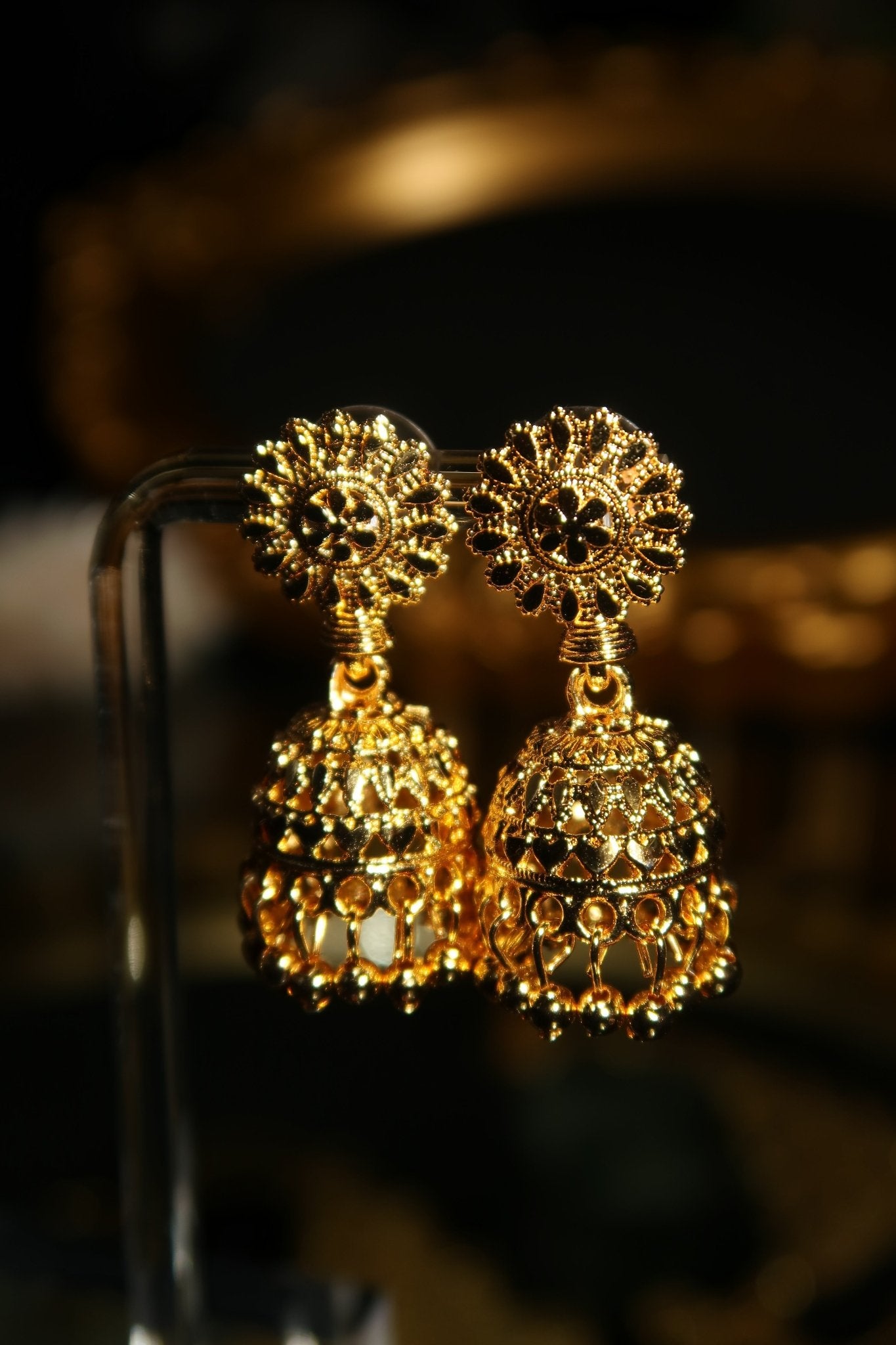 Gold plated Sabia jhumka earrings with floral stud top