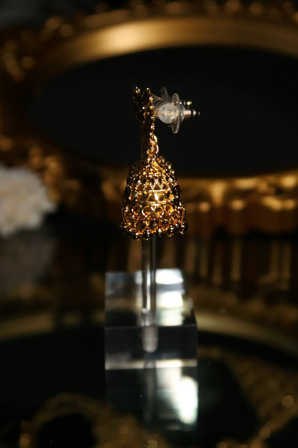 Gold plated Sabia jhumka earrings with floral stud top