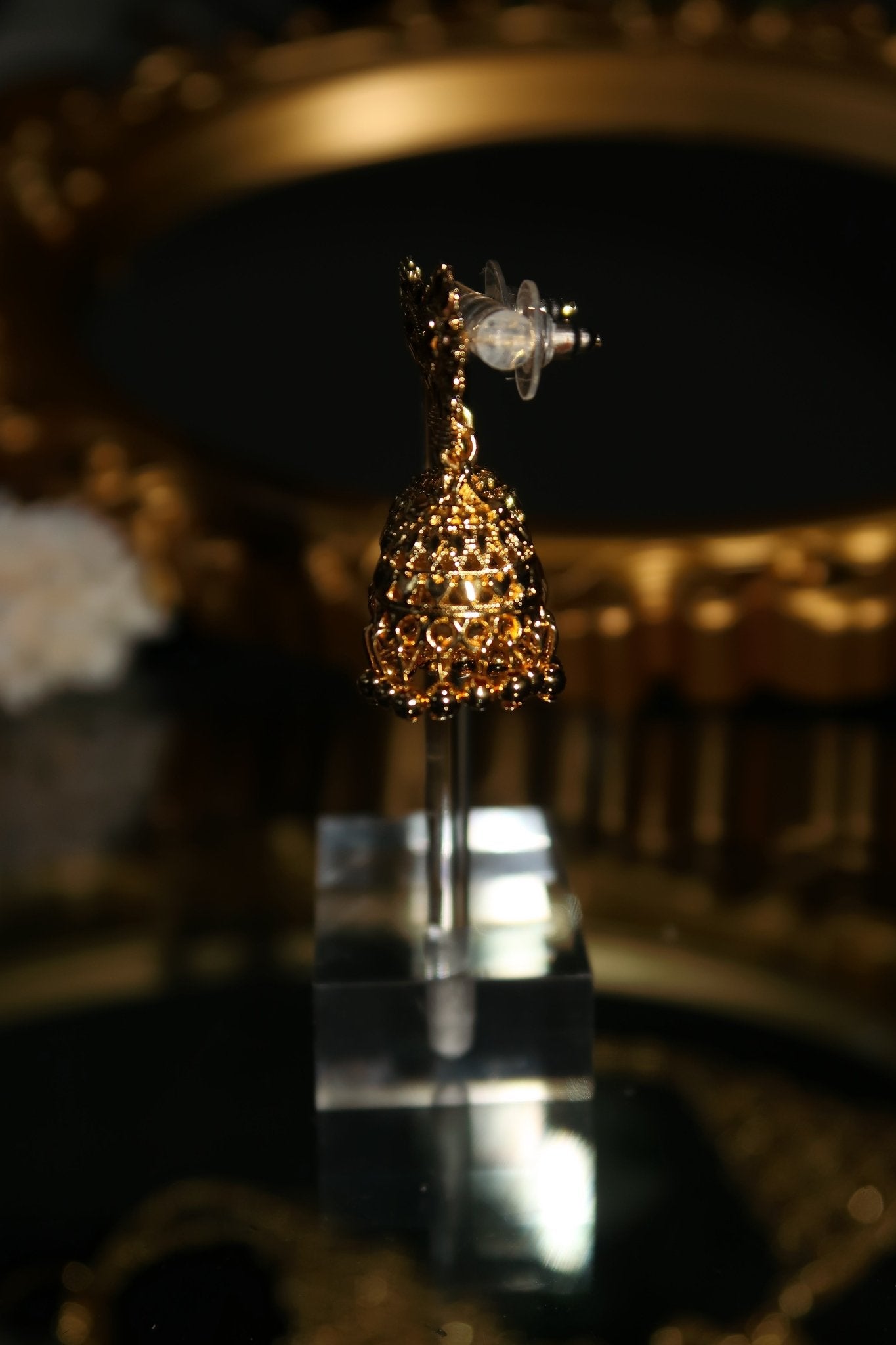 Gold plated Sabia jhumka earrings with floral stud top