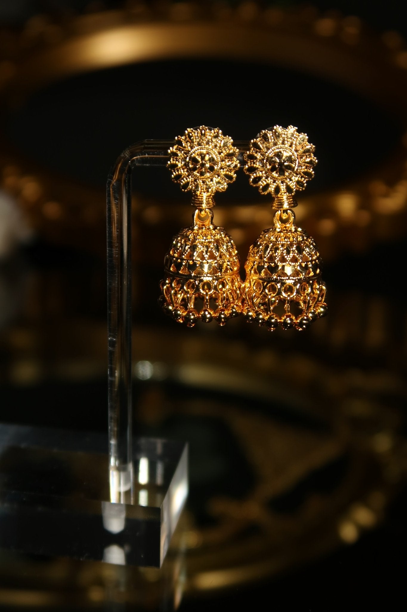 Gold plated Sabia jhumka earrings with floral stud top