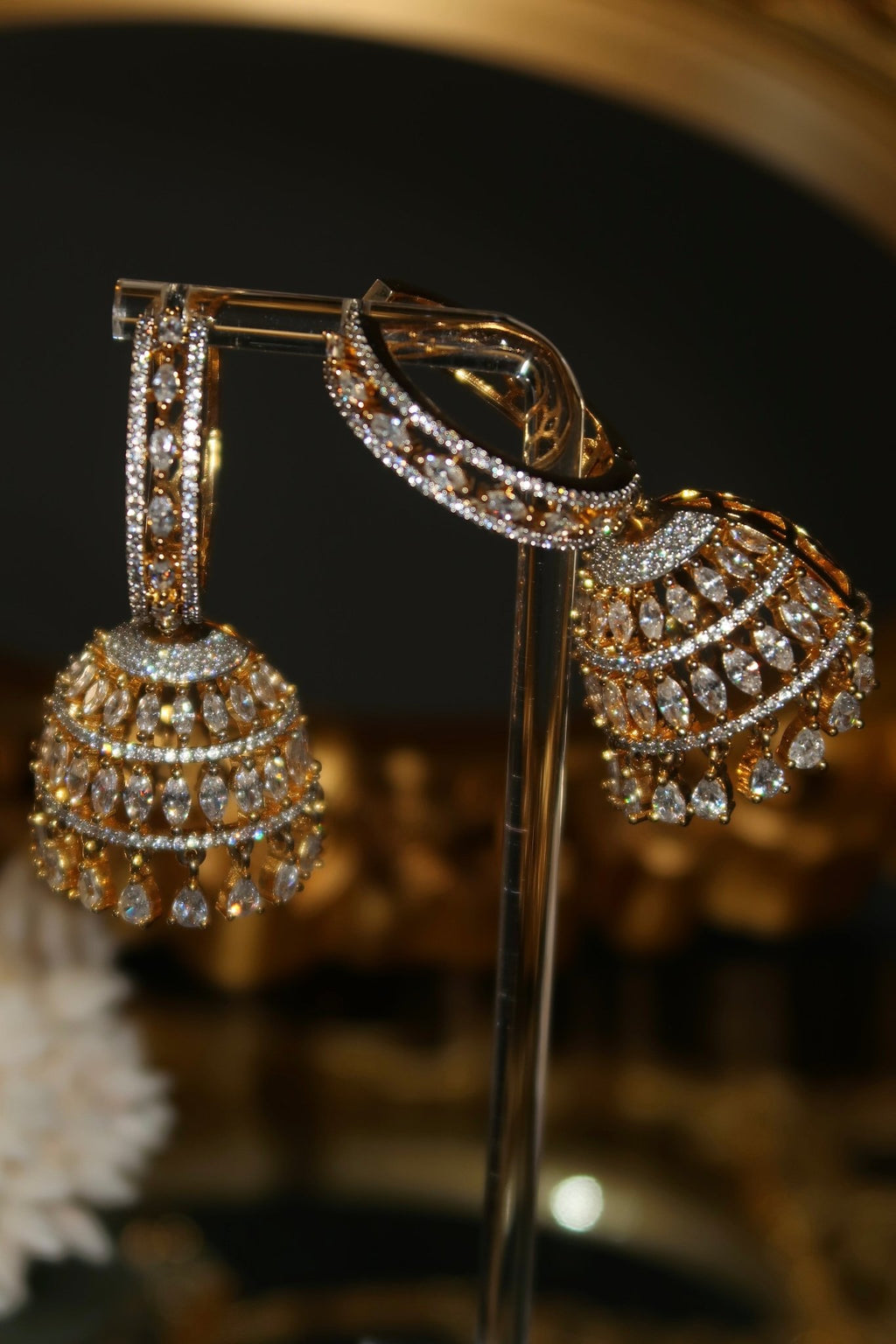 Gold-plated Sarima jhumka earrings with CZ stones
silver rhodium Sarima jhumka earrings 
jhumka earrings styled with outfit"